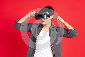 Young Man Wearing VR Headset