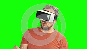 Young man wearing VR virtual reality goggles