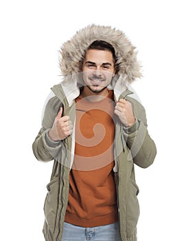 Young man wearing warm clothes on white. Ready for winter vacation