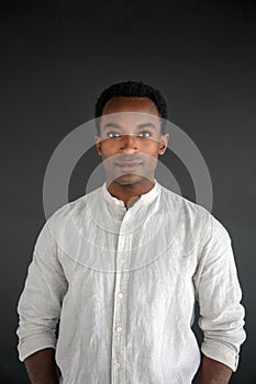 african man portrait studio head shot white shirt