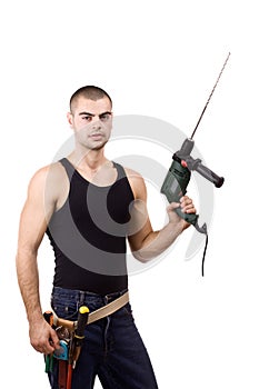 Young man whit drillmachine