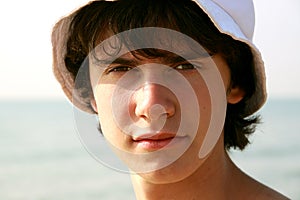 The young man and a white cap 1