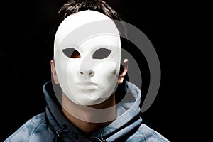 Young man with white mask