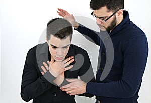 Young man who is choking