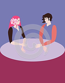 Young man and woman with expressive faces sit at a large round table and look at each other. Emptiness instead of body.