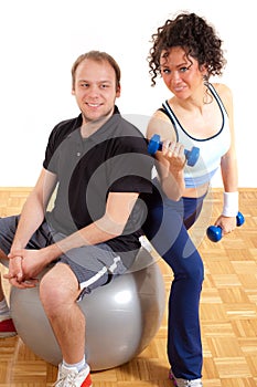 Young man and woman fitness exercising