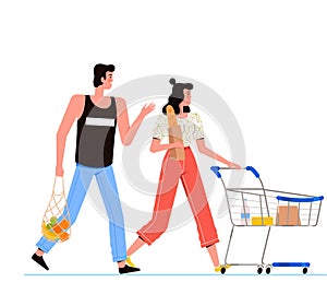 Young man and young woman go shopping and have a conversation. Young couple holding pockets and shopping cart buy