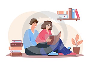 Young man and woman reading paper book.