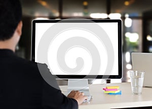 young man working Businessman using a desktop computer of the bl