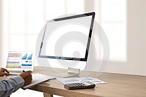 Young man working Businessman using a desktop computer of the blank screen