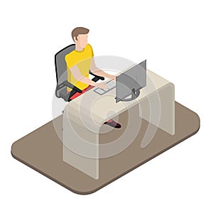 A young man working at a computer, a designer at a table