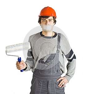 A young man in working grey clothes and orange hard helmet man with tape over mouth. Isolated on white background.