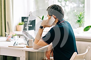 The young man working from home