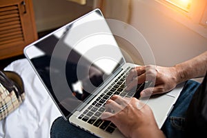 Young man working with laptop