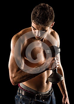 Young Man Working Out Biceps - Dumbbell Concentration Curl