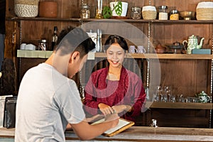 Young man write the menu