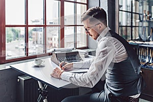 Young man writing the screenwriter photo