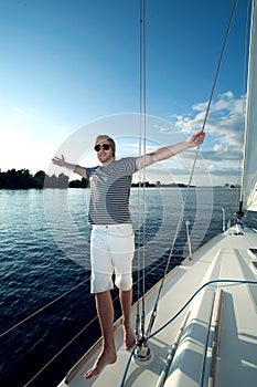 young man on a yacht