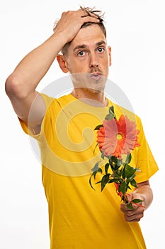 Young man in yellow on white