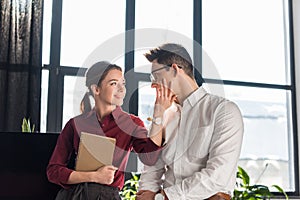 young manageress flirting with her colleague office