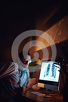 Young medic is working on night shift