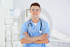 Young medical assistant with stethoscope