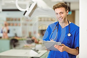 Young medical student writing notes