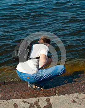 Young men against the river