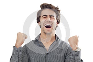 Young men with arms up celebrating his success