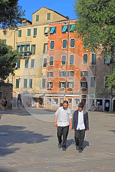 Young men on main square of The Venetian Ghetto