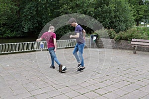 Young men playing with a ball