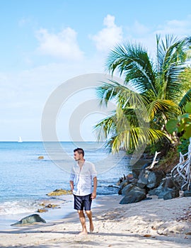 young men in swimshort on vacation Saint Lucia, luxury holiday Saint Lucia Caribbean