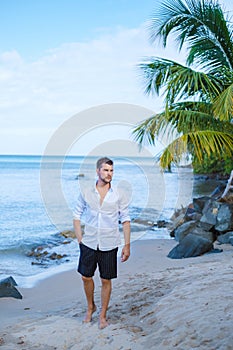 young men in swimshort on vacation Saint Lucia, luxury holiday Saint Lucia Caribbean