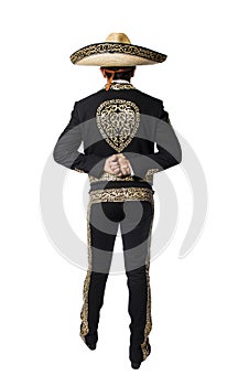Young mexican male in a traditional charro costume photo
