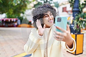 Young middle east woman excutive smiling confident having video call at park