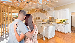 Young Military Couple Facing House Construction Framing Gradating Into Finished Kitchen Build