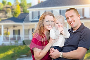 Young Military Family in Front of Their House