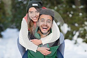 Young Mix Race Couple Snow Forest Outdoor Winter Walk