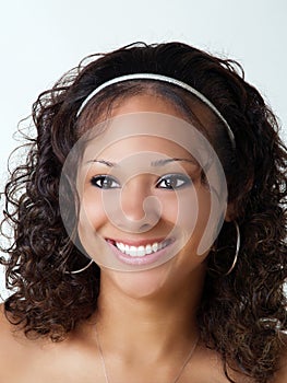 Young mixed black teen girl smiling portrait