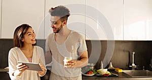 Young Mixed Race Couple Using Tablet Computer Morning Sunlight, Happy Hispanic Man Asian Woman Together In Kitchen