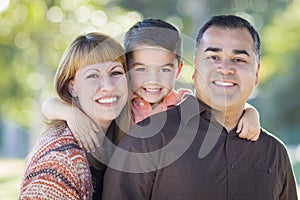 Young Mixed Race Family Portrait Outdoors