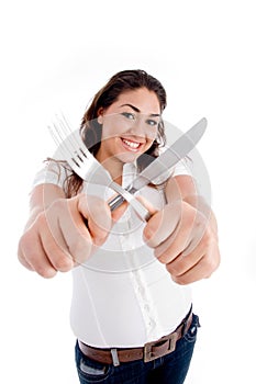 Young model holding fork and knife