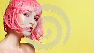 Young Model in Pink Wig. Beautiful Model with Fashion Makeup. Bright Spring Look. Sexy Hair Color, Medium Hairstyle