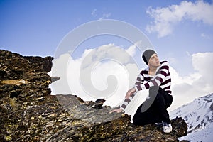 Young model posing at high altitude