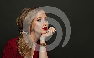 Young model woman with handwatch on black banner background photo