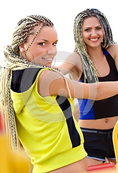 Young models working out on fitness playground