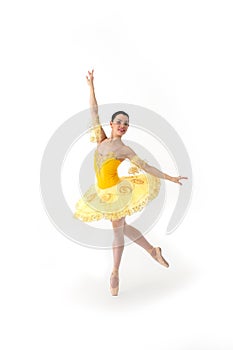 Young modern ballet dancer in yellow dress isolated on white background