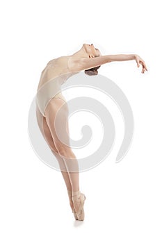 Young modern ballet dancer jumping on white background