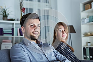 Young modern couple is irritated of christmas