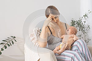 The young mom wants to breastfeed her newborn baby